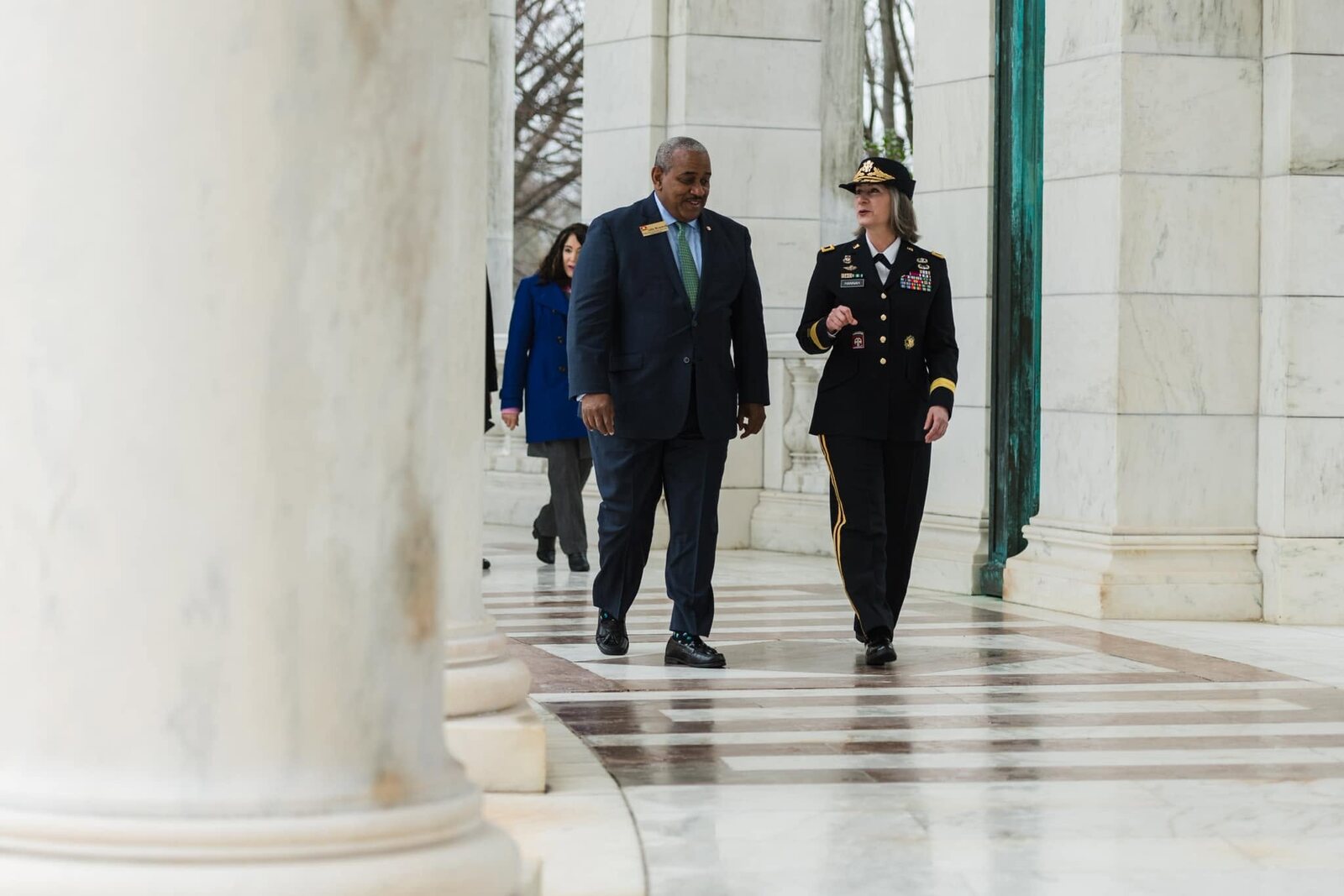 Allie Braswell in conversation with a senior Army leader at Arlington National Cemetery