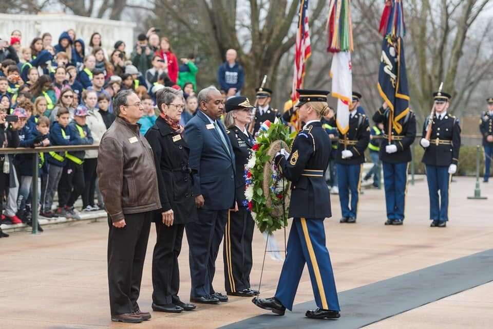 Allie Braswell participating in a military wreath-laying ceremony